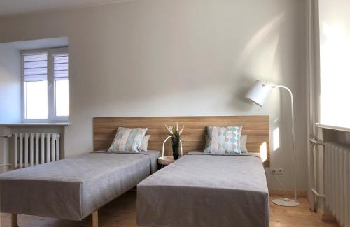 Kaunas Apartment | Cozy Patogūs Namai: Child-Friendly Retreat with 9.3 Rating