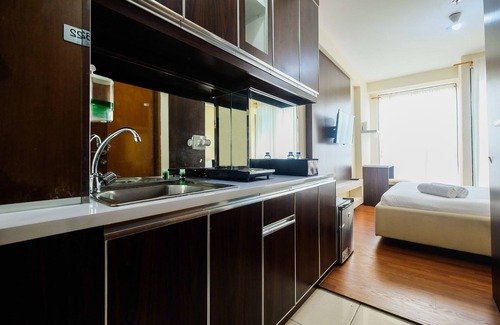 Kayu Putih Apartment | Cozy Tifolia Apartment with Pool & Breakfast Included