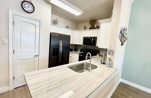 Safe Harbor Condo | Unbeatable Stay: Pet Friendly, Pool Access Near the Beach