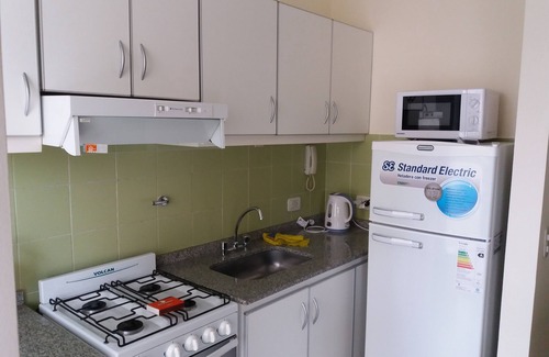 Centro Apartment | Experience Comfort at Como en Casa 2 with Spa & Kitchen
