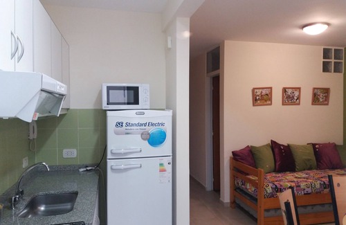 Centro Apartment | Experience Comfort at Como en Casa 2 with Spa & Kitchen