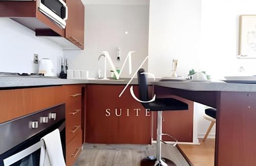 Historical District Apartment | Elegant Comfort Steps from Mall Plaza with Ocean Views