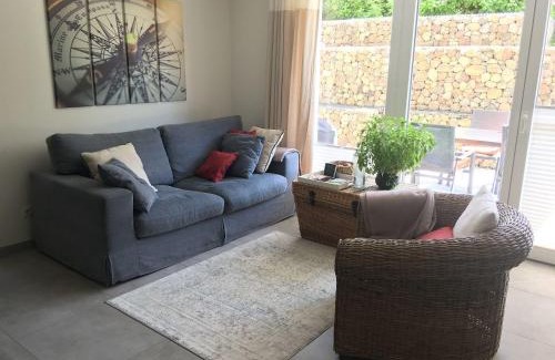 Hohwacht Apartment | Oceanfront Retreat: 4-Star Stay with Exceptional Reviews