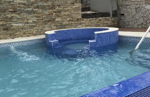 Ostende Apartment | Discover Complejo Ayenué & Spa II: Oceanfront Relaxation