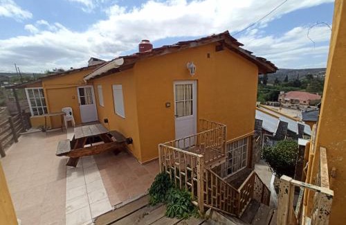 Tanti Apartment | Discover Complejo El Alto: Family-Friendly with Pool & Breakfast