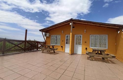 Tanti Apartment | Discover Complejo El Alto: Family-Friendly with Pool & Breakfast
