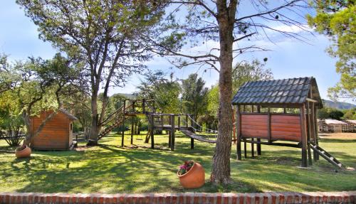 Villa General Belgrano Cabin | Exceptional Complejo el Paine with Ocean Views & Pool