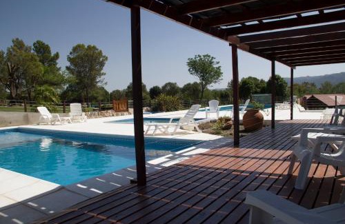 Villa General Belgrano Cabin | Exceptional Complejo el Paine with Ocean Views & Pool