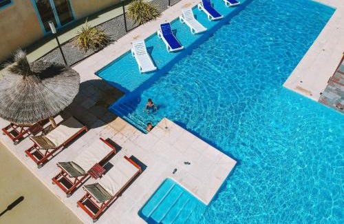 Las Grutas Apartment | Discover Complejo Tamariscos: Family-Friendly with Pool