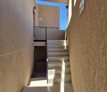Las Grutas Apartment | Discover Complejo Tamariscos: Family-Friendly with Pool