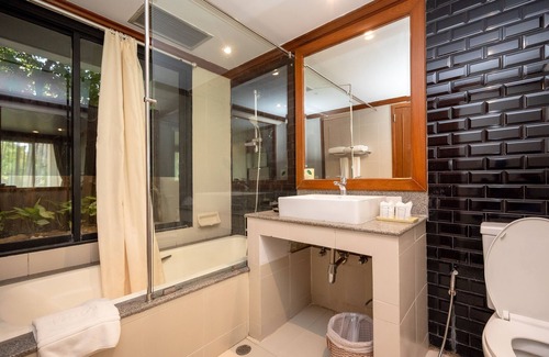 Kanchanaburi Hotel | Relax at Comsaed River Kwai Resort with Pool & Spa Amenities
