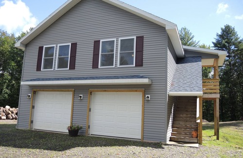 Otego Apartment | Newly Built Cone's Cottage Near All Star Village with Fire Pit