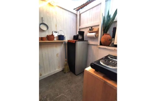 De Guadalupe Apartment | Cozy Studio in the Heart with WiFi & Breakfast Included