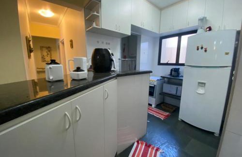 Praia da Enseada Apartment | Inviting Apartment with Pool for 8 in Ubatuba's Enseada