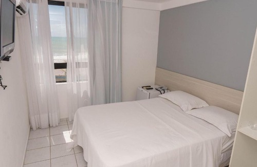 Areia Preta Apartment | Relaxing Oceanview Suite with Family-Friendly Amenities