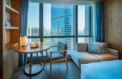 Zhujiang New Town Hotel | Experience Luxury at Conrad Guangzhou: 5-Star Comfort Awaits