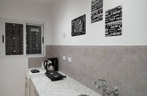 San Juan Apartment | Family-Friendly Retreat at Consorcio General Acha Apartments