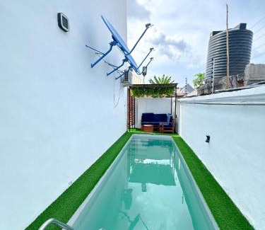 Okpanam Apartment | Inviting Consume Maisonette with Pool and Hot Tub Access