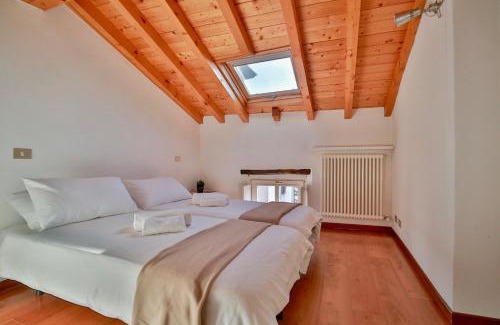Centro Valle Intelvi Apartment | Modern Ca' Brenta Attic - Family and Pet-Friendly Retreat