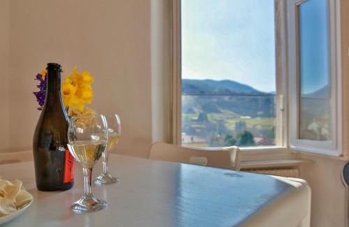 Centro Valle Intelvi Apartment | Modern Ca' Brenta Attic - Family and Pet-Friendly Retreat