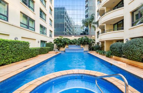 Parramatta Apartment | Modern 1-Bedroom Retreat with Pool for Family Fun