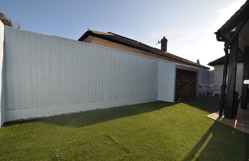 Southbourne Apartment | Stylish Garden Apartment Steps from the Beach with Pool