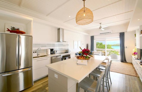 Governor's Harbour Apartment | Bright 2BR Apartment with Bay View, Near Shops & Dining