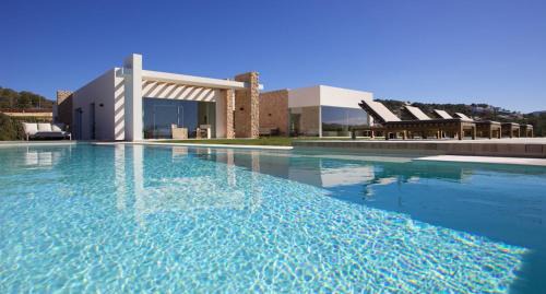 Cala Comte Villa | Modern Ibizan Villa Near Cala Conta Beach with Ocean Views