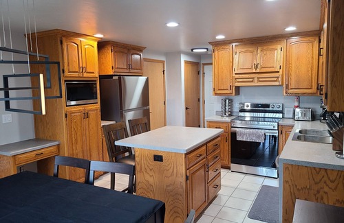 Green Bay House | Prime Location Near Green Bay's Beltline with Lake Views