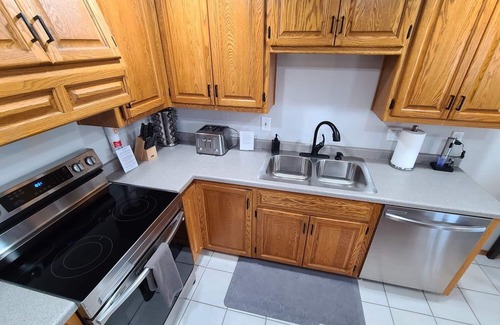 Green Bay House | Prime Location Near Green Bay's Beltline with Lake Views