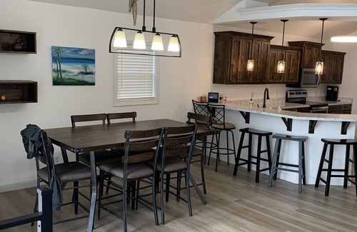 Sunrise Beach House | Prime Location: Remodeled Lake Home with Pool & Pet Friendly