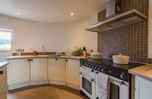 Ewhurst Green House | Discover the Unique Oast House in Brede Valley with Pool