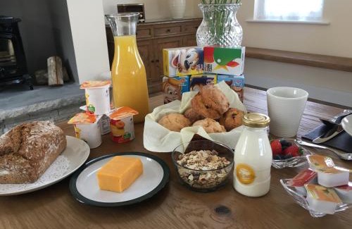 Liscannor Bed & Breakfast | Oceanfront Escape at Conway's Cottage by Cliffs of Moher