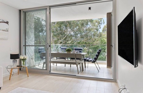 Gosford Apartment | Bright Coastal Retreat with Panoramic Water Views
