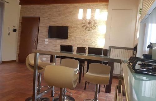 Paratico Apartment | Elegant Copelia: Family-Friendly Pool Retreat with High Ratings