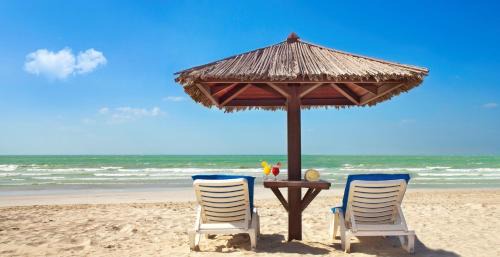 Beach & Coast Resort | Beachfront Bliss at Coral Beach Resort Sharjah