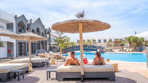 El Cotillo Hotel | Serene Coral Cotillo Beach: Oceanfront Retreat with Pool