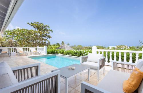 St. Marie Villa | Elegant Coral Estate Holidays with Private Beach & Spa