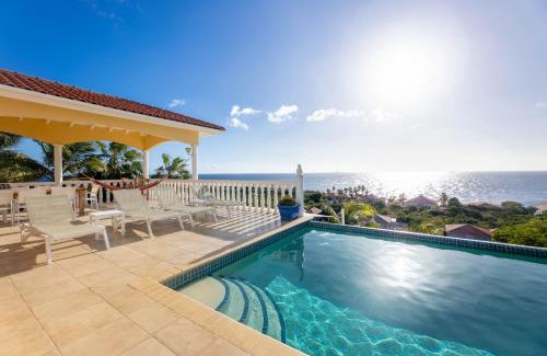 St. Marie Villa | Elegant Coral Estate Holidays with Private Beach & Spa