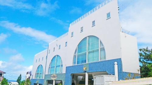Kadena-cho Apartment | Inviting Coral Garden with 7 Pools and Private Hot Tub