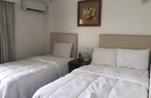 Songsong Hotel | Oceanfront Coral Garden Hotel with Family-Friendly Amenities
