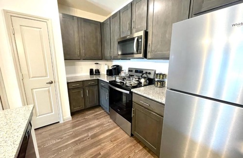 Montopolis Apartment | Experience Comfort at Coral Garden with Pool & Family Amenities