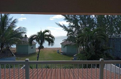 Coral Harbour Apartment | Relax at Coral Harbour Beach Apartment with Oceanfront Views