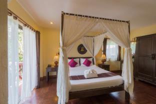 Phongprasan Resort | Discover Coral Hotel Bangsaphan: Beachfront Bliss Awaits