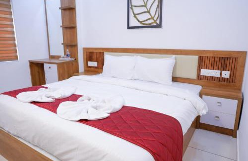 Kattappana House | Family-Friendly Coral Inn Residency with Top Guest Ratings