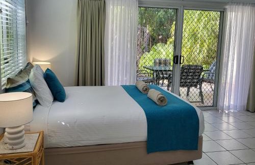 Agnes Water Apartment | Elegant Coral Suite with Oceanfront Views and Pool Access