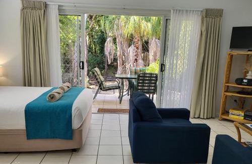 Agnes Water Apartment | Elegant Coral Suite with Oceanfront Views and Pool Access
