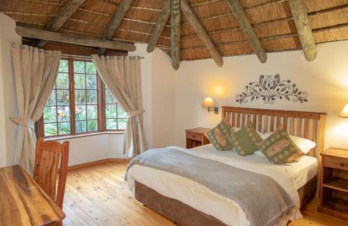 Buffalo Hills Game Reserve Apartment | Inviting Coral Tree Cottages: 4-Star Stay with Pool Access