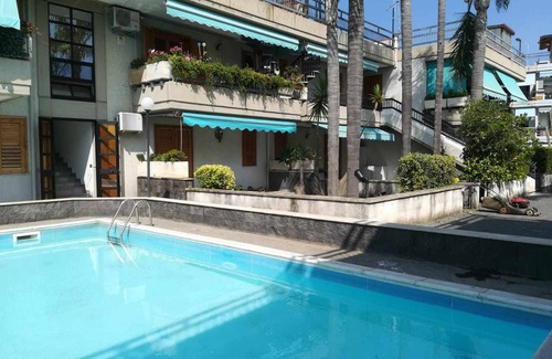 Fondachello Apartment | Experience Coraline Beach House with Oceanfront Amenities