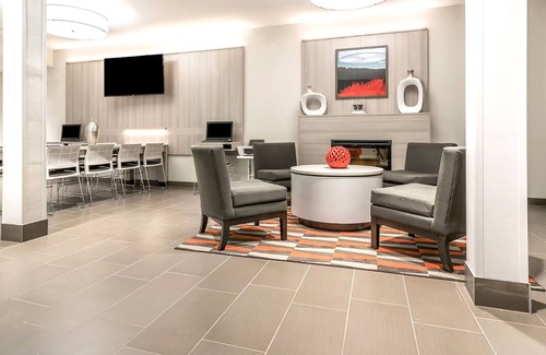 Rochester House | Comfortable Coratel Inn & Suites with Great Amenities